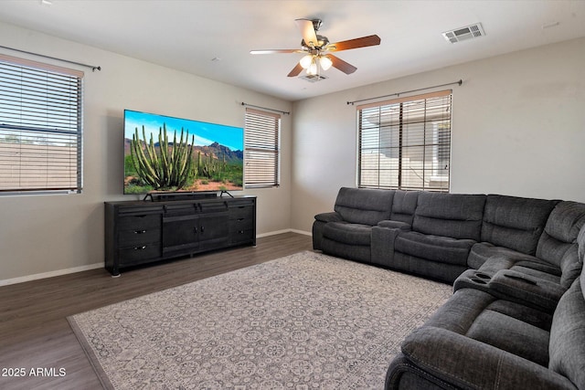 17802 N 114th Ln, Surprise, AZ 85378 - living area featuring wood finished floors, baseboards, and ceiling fan