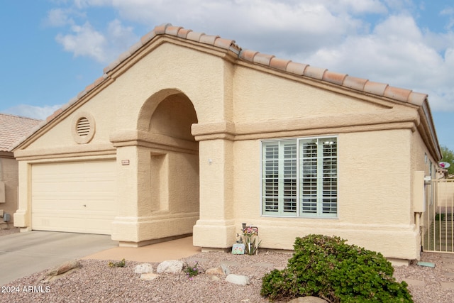 view of front of home featuring a garage