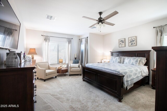 6460 W Springfield Way, Florence, AZ 85132 - bedroom featuring light colored carpet, visible vents, and multiple windows