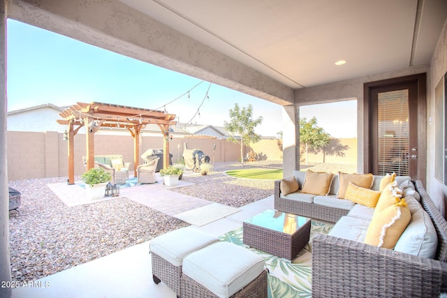 view of patio / terrace featuring a fenced backyard, a pergola, and an outdoor hangout area