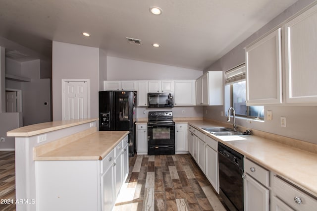 kitchen featuring white cabinets, a center island, dark wood-type flooring, and black appliances