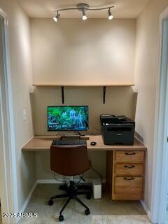 home office featuring light tile patterned floors