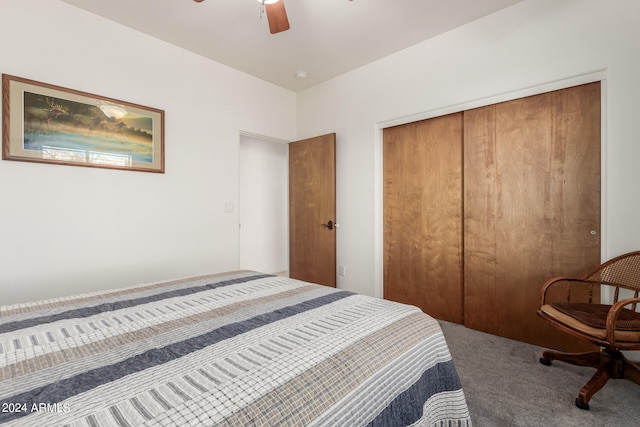 bedroom with a closet, ceiling fan, and carpet