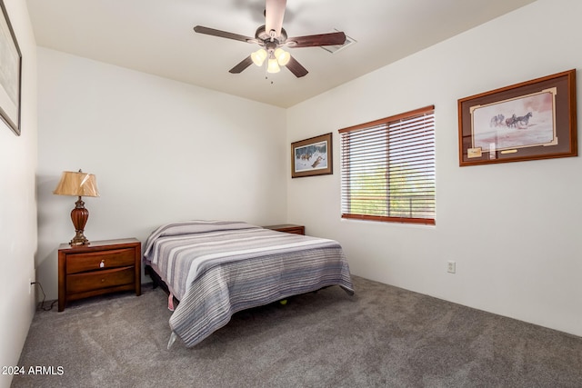 carpeted bedroom featuring ceiling fan