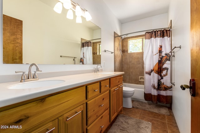 full bathroom featuring tile floors, toilet, shower / bath combo, and dual vanity