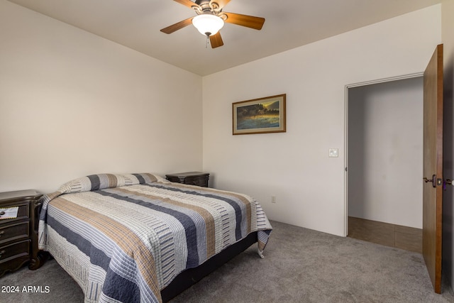 carpeted bedroom featuring ceiling fan