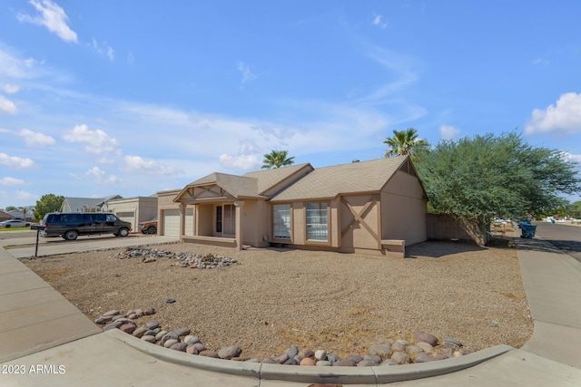 view of front of property with a garage