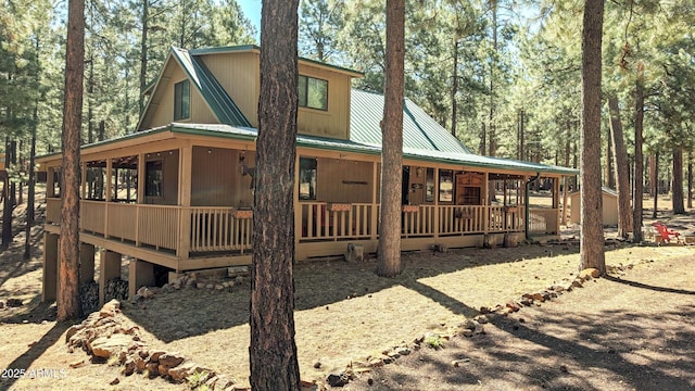 2425 Tall Trees Loop, Forest Lakes, AZ 85931 - view of front of property with covered porch and a metal roof