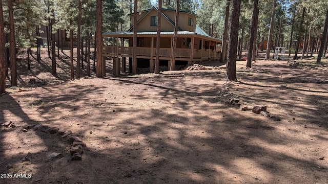 2425 Tall Trees Loop, Forest Lakes, AZ 85931 - back of property featuring covered porch and a metal roof