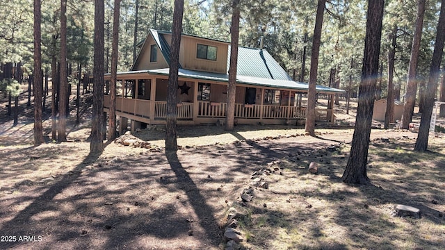2425 Tall Trees Loop, Forest Lakes, AZ 85931 - view of front of property with covered porch and a metal roof
