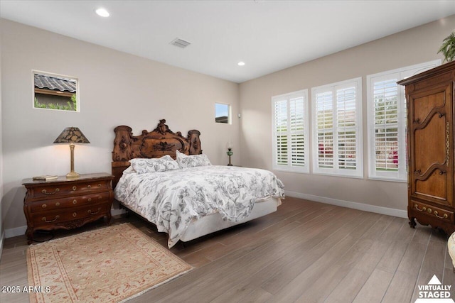 bedroom featuring wood-type flooring