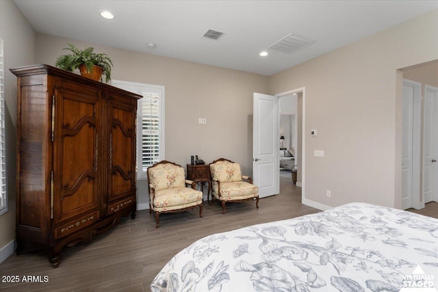 bedroom featuring wood-type flooring