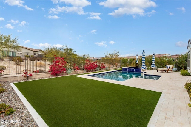 view of pool with a lawn, a patio area, and an in ground hot tub