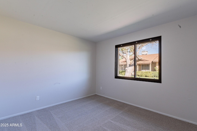 2440 N 22nd Ave, Phoenix, AZ 85009 - carpeted empty room with baseboards