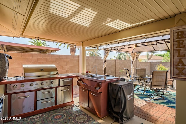view of patio / terrace with outdoor dining area and fence