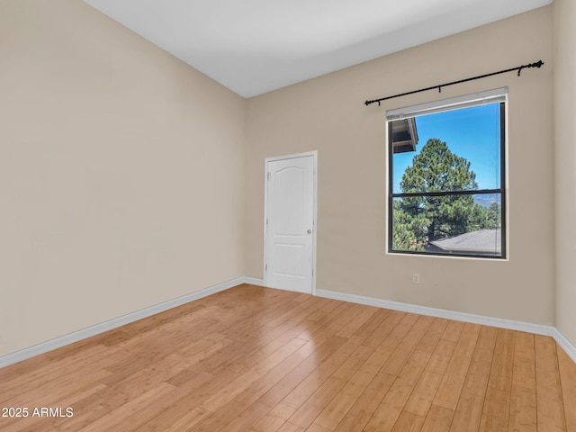 1401 N 4th St Unit 234, Flagstaff, AZ 86004 - spare room featuring light wood-type flooring and baseboards