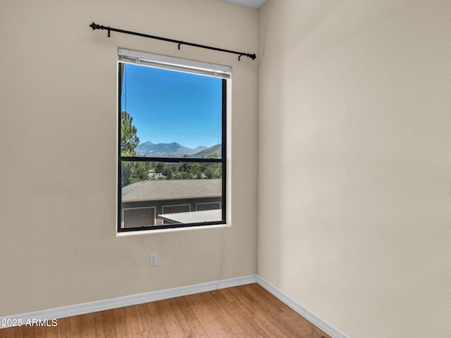 1401 N 4th St Unit 234, Flagstaff, AZ 86004 - unfurnished room featuring wood finished floors and baseboards