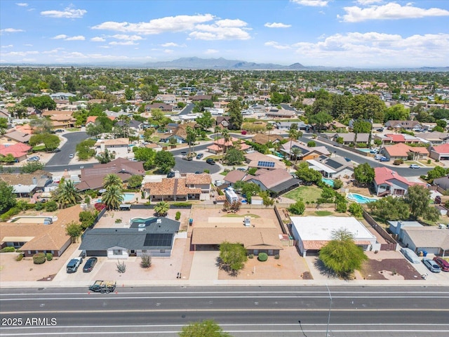 bird's eye view featuring a residential view and a mountain view