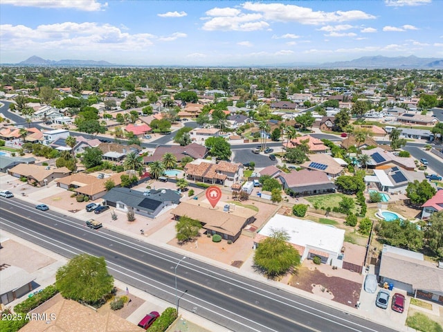 bird's eye view with a residential view and a mountain view