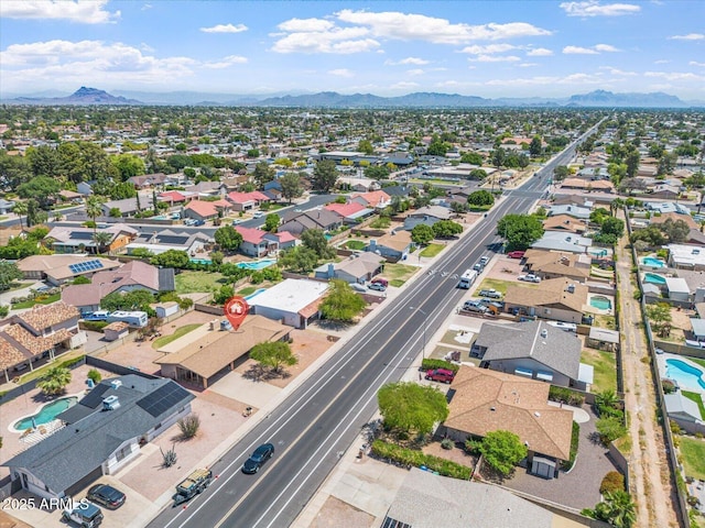 drone / aerial view with a mountain view and a residential view