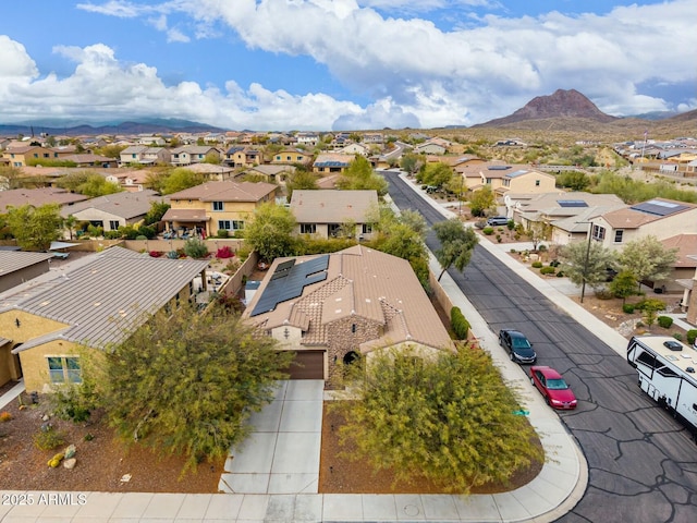 aerial view featuring a mountain view and a residential view