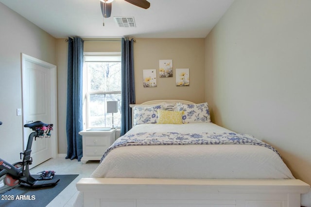 bedroom featuring a ceiling fan and visible vents