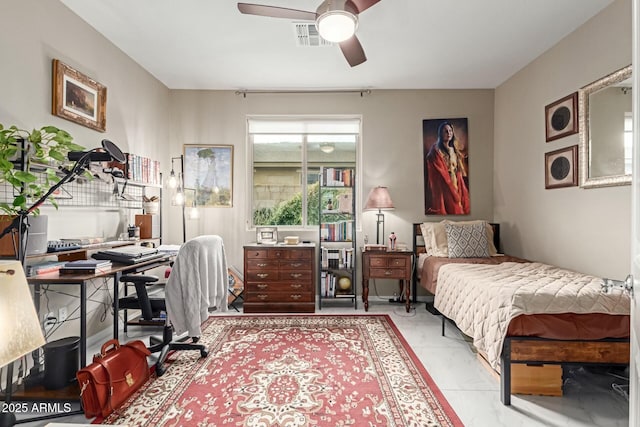 bedroom with visible vents and marble finish floor