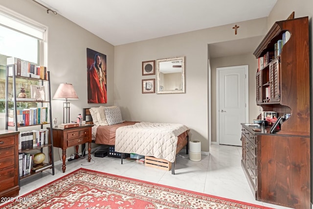 bedroom with marble finish floor