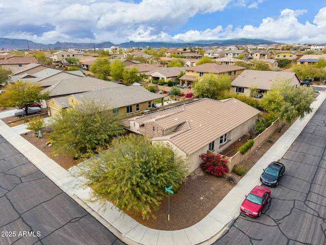 bird's eye view with a residential view and a mountain view