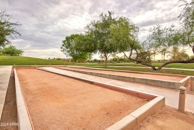 surrounding community featuring a yard