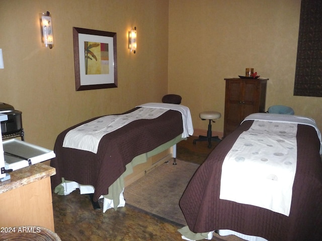 bedroom featuring dark colored carpet