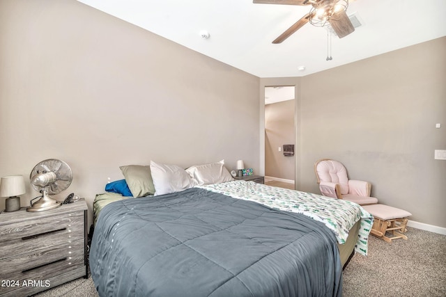 bedroom featuring ceiling fan and light colored carpet