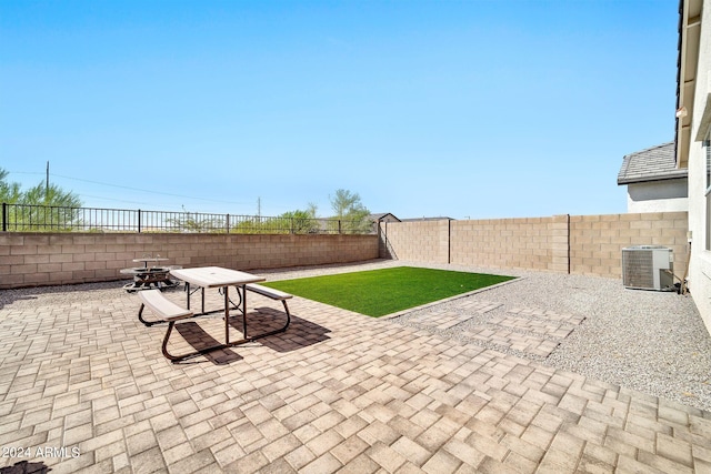 view of patio / terrace with central AC unit