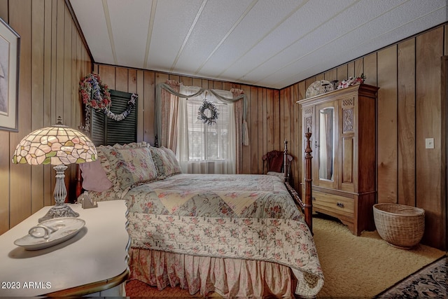 bedroom with wooden walls