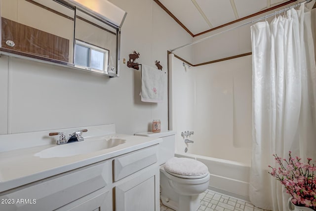 full bathroom featuring toilet, lofted ceiling, vanity, and shower / bath combo with shower curtain