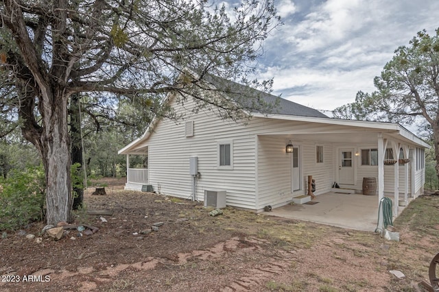 back of property with a patio area