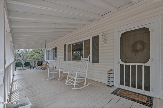 wooden deck featuring a porch