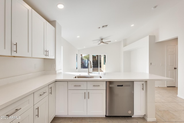 kitchen featuring white cabinetry, sink, kitchen peninsula, and dishwasher