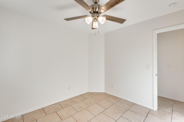 tiled empty room with ceiling fan