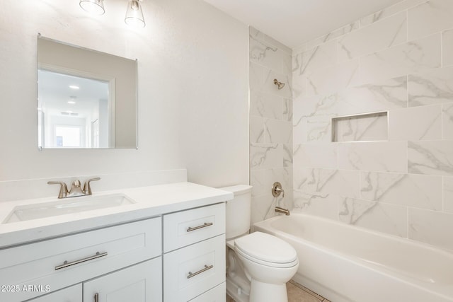 full bathroom with vanity, toilet, and tiled shower / bath combo