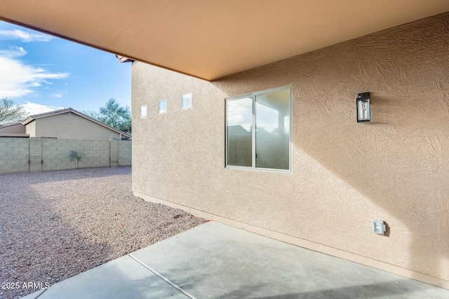 view of home's exterior featuring a patio