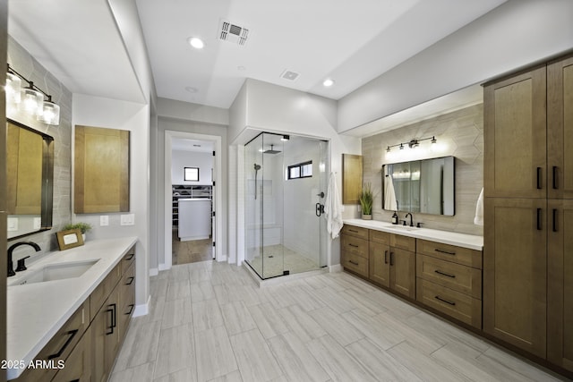 bathroom featuring vanity and walk in shower