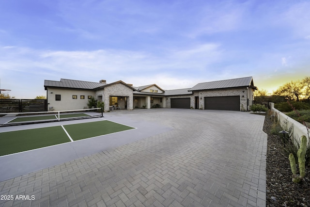 view of front of property featuring a garage