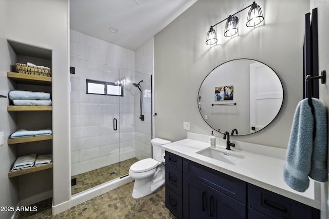 bathroom featuring walk in shower, vanity, and toilet