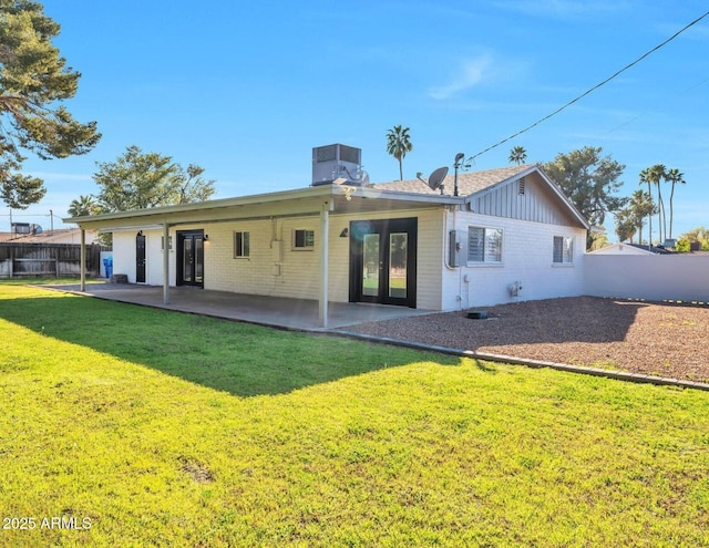 6805 N 12th St, Phoenix, AZ 85014 - back of property with a yard, french doors, fence, and a patio area