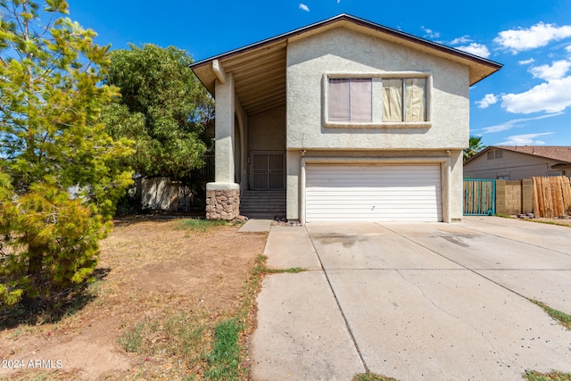 view of front of home featuring a garage