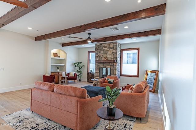 8214 N 16th St, Phoenix, AZ 85020 - living area featuring light wood-style flooring, recessed lighting, baseboards, a ceiling fan, and a fireplace