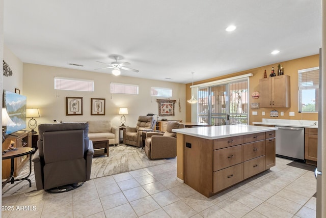 20394 N Coronado Way, Surprise, AZ 85374 - kitchen with dishwasher, light countertops, ceiling fan, healthy amount of natural light, and recessed lighting