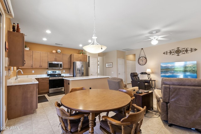 20394 N Coronado Way, Surprise, AZ 85374 - dining room featuring light tile patterned flooring, ceiling fan, and recessed lighting