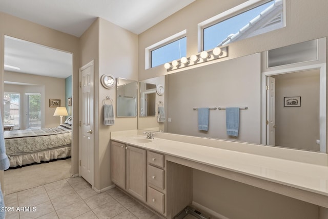20394 N Coronado Way, Surprise, AZ 85374 - bathroom featuring ensuite bath, vanity, and tile patterned flooring